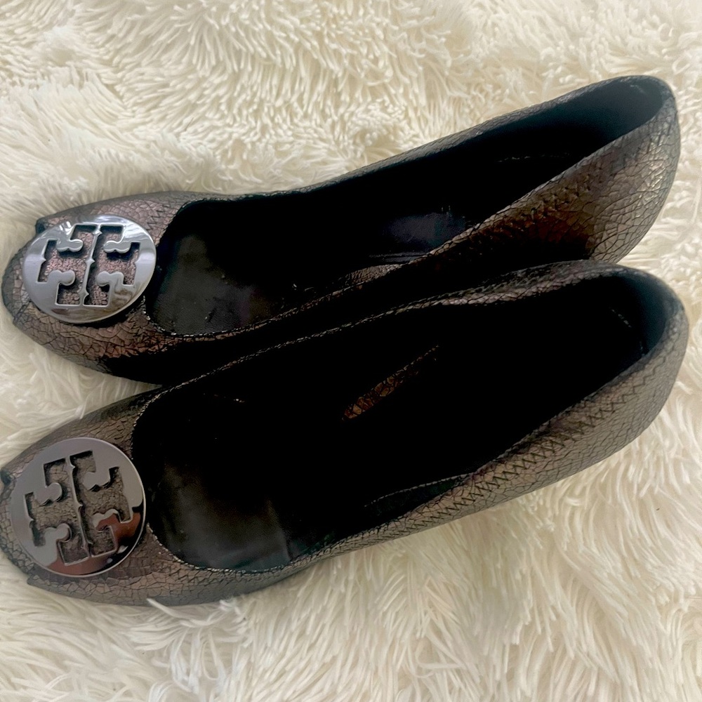 Tory Burch wedge shoes size 11. Metallic color . No box . Great condition